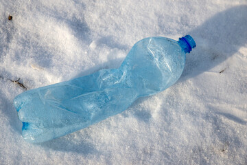 empty used plastic bottle as a symbol of environmental pollution