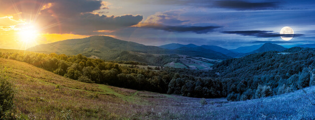 day and night time change concept above carpathian countryside in september at twilight. beautiful...