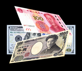 American dollar, Chinese yuan and Japanese yen banknotes as trade and business concept