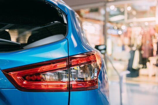 Vilnius, Lithuania - September 21, 2017: Red LED Rear Lights Of Blue color compact crossover SUV Car Nissan Qashqai In Hall Of Shopping Center. Close Up Of Light