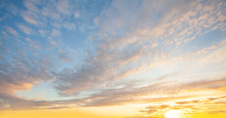 Naklejka na ściany i meble Colorful sunset background. Sky clouds background