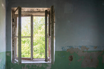 Window in the room of the old house.