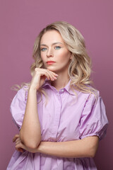 Fototapeta premium Serious woman on pink background