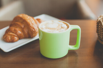 Coffee cup in city street cafe