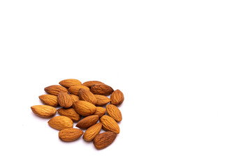 Appetizing almonds on a white background, healthy protein food, food for vegetarians