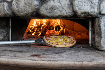 pizza in wood fire oven