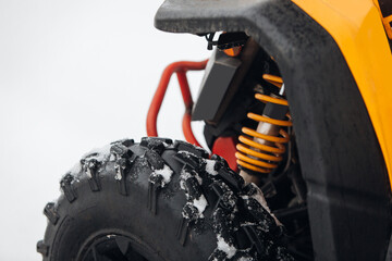 Coils and suspension of quad bike at the forest close up