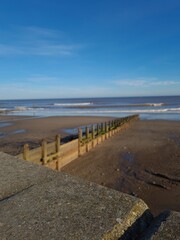 Fototapeta na wymiar Hornsea beach in East Yorkshire in England UK on a sunny day