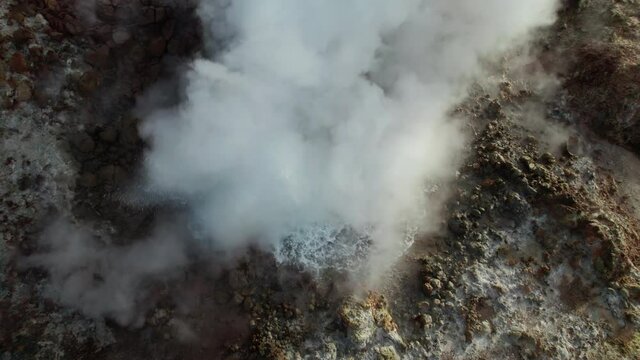 Drone Shot Of Steam Pouring From Hot Spring