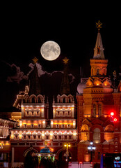 Fototapeta na wymiar The moon with a magnificent view over the red square of Moscow