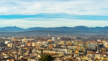 Fototapeta na wymiar Girona cityscape with the mountains at the background
