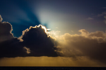 Evening clouds with sun rays