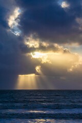 Evening clouds with sun rays