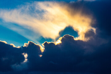 Evening clouds with sun rays
