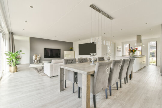 Dining table with chairs in open plan living room