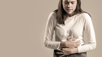 Woman Stomach Ache. Woman touching his stomach. Stomach pain and others stomach disease...