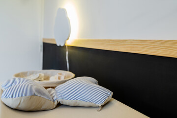 Baby booties and clothes in room