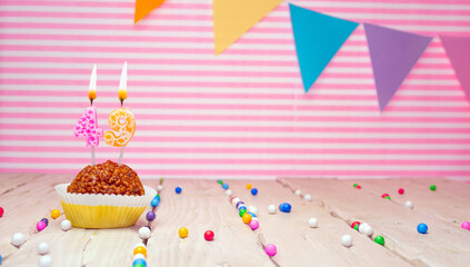 Happy birthday for 49 years old. Festive background with muffin. Copy space birthday card forty nine years old on a pink background