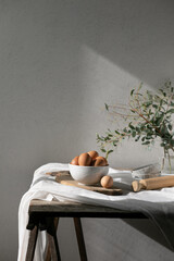 Bakery ingredients for homemade cooking or baking on table. Food set on wooden table. Copy space
