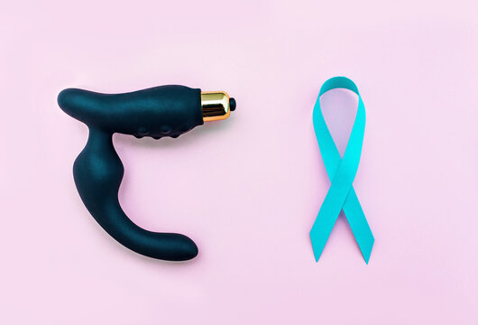 Prostate stimulator - massager provides intense prostate stimulation and light blue ribbon as symbol of prostate cancer awareness. Men's health