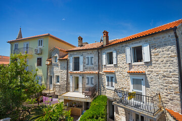 Fototapeta na wymiar View on the beautiful houses of Budva
