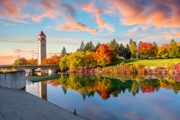 Colorful autumn sunset at Riverfront Park along the Spokane River in downtown Spokane, Washington,...