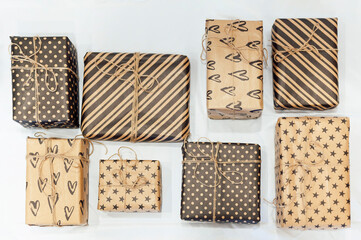 Handmade paper gift boxes on white background. Ecological concept.top view