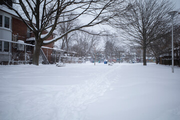 Toronto, Ontario / Canada - January 17, 2022 - Toronto St Clair West Graham Park covered in snow