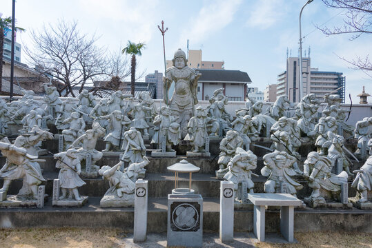 Osaka, Japan - Feb 28 2018: Forty-seven Ronin Statues at Kissho-ji Temple in Tennoji, Osaka, Japan. a famous historic site.