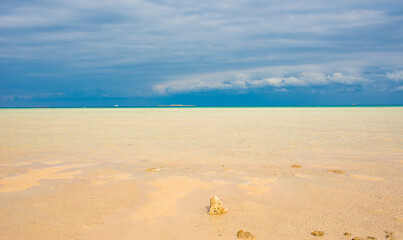 
idyllic panorama of the red sea coast in sahl hasheesh area, with turquoise and blue clear water, light sand and clouds, similar to the maldives