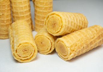 Wafer rolls. Confectionery. Cookies for tea. Variety of waffles. Product with stuffing inside.