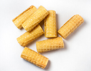 Wafer rolls. Confectionery. Cookies for tea. Variety of waffles. Product with stuffing inside.