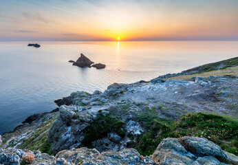 Sunset over calm Atlantic ocean,Trevose Head,Cornwall,England,United Kingdom.