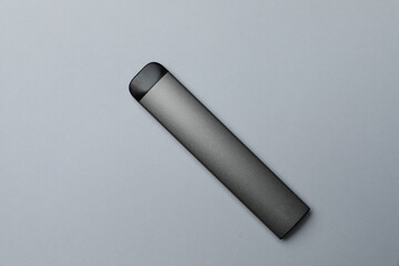 Electronic cigarette on light background, top view