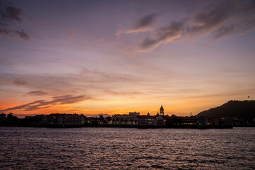 Naklejka premium Antique city, Panama, church tower in sunset
