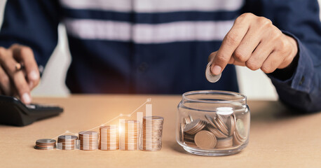 Businessman holding coins putting in glass. concept saving money for finance accounting.