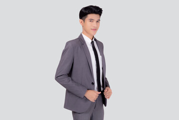 Obraz na płótnie Canvas Portrait young asian businessman in suit smiling with confident and friendly isolated on white background, business man smart with success, manager or executive with handsome and leadership.