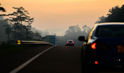 Travel in the morning on the expressway, view from behind the car.