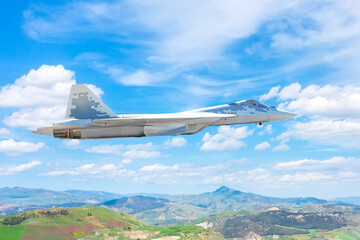Fototapeta na wymiar Flight on the hilly terrain of the latest generation military fighter jet plane, reconnaissance.