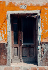 Decrepid Building and Old Wooden Door