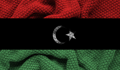 Libya flag on knitted fabric. 3D-image