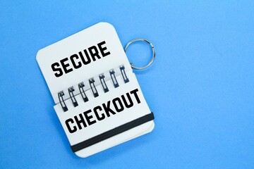 small notebook with the word secure checkout