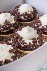 Chocolate cupcakes with Italian Meringue Buttercream and Dark chocolate topping