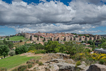 Fototapeta na wymiar Views of the walled city of Avila Walls of Avila, Spain. This site is a National Monument, and the old city was declared a World Heritage site by UNESCO