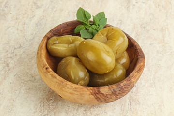 Pickled green tomato in the bowl