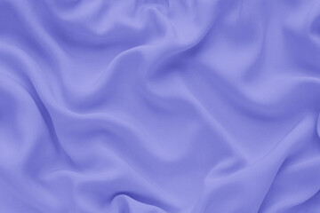 Violet silk texture, abstract background luxury fabric with wavy folds, trendy color 2022