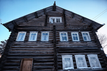 windows in an old wooden house, russian north architecture design