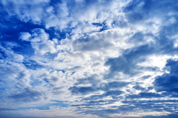 blue cloudy sky on a sunny day background screensaver backdrop