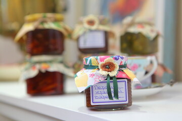 Assorted jams on the table in the kitchen