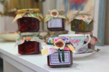 Assorted jams on the table in the kitchen